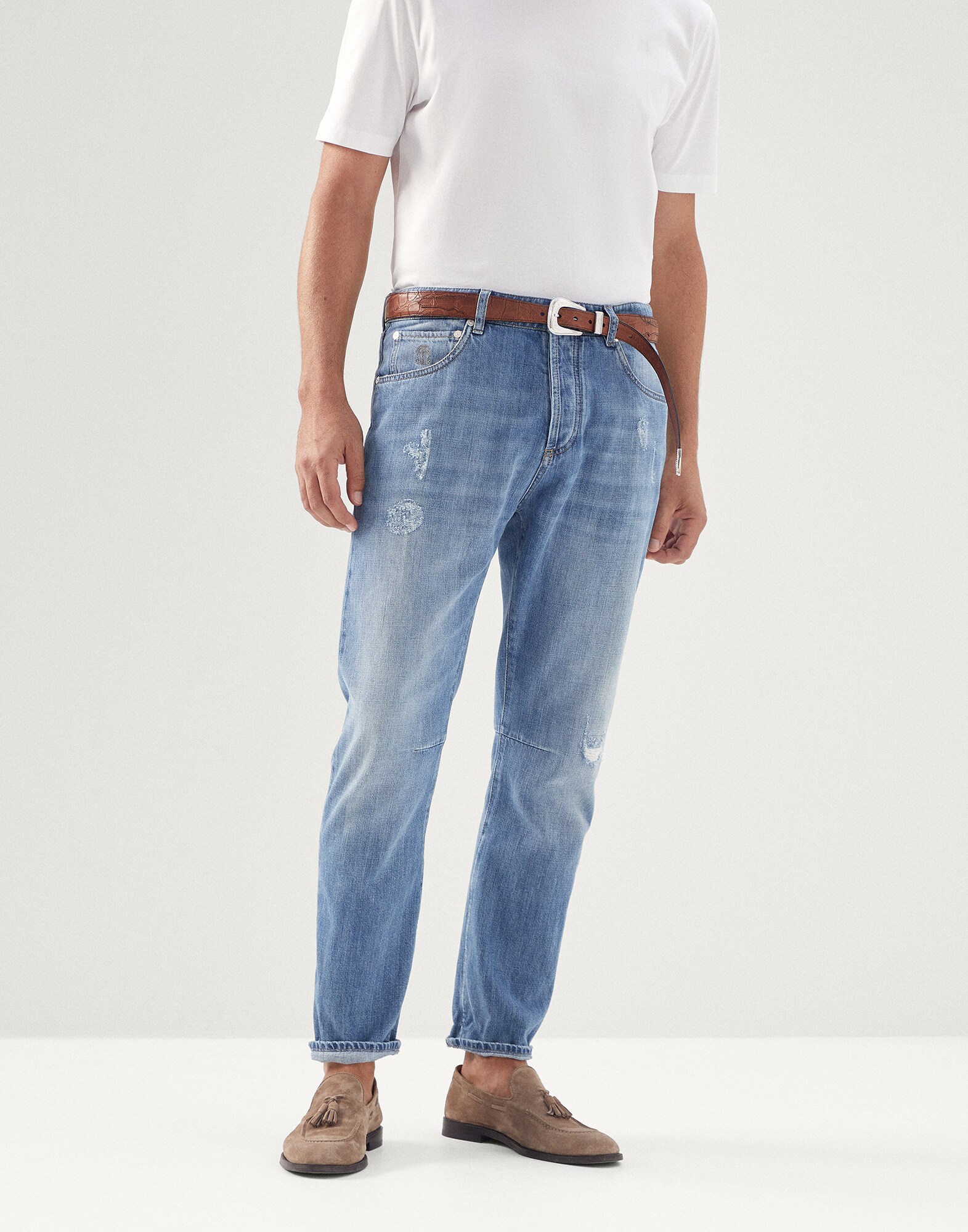 Denim trousers with rips